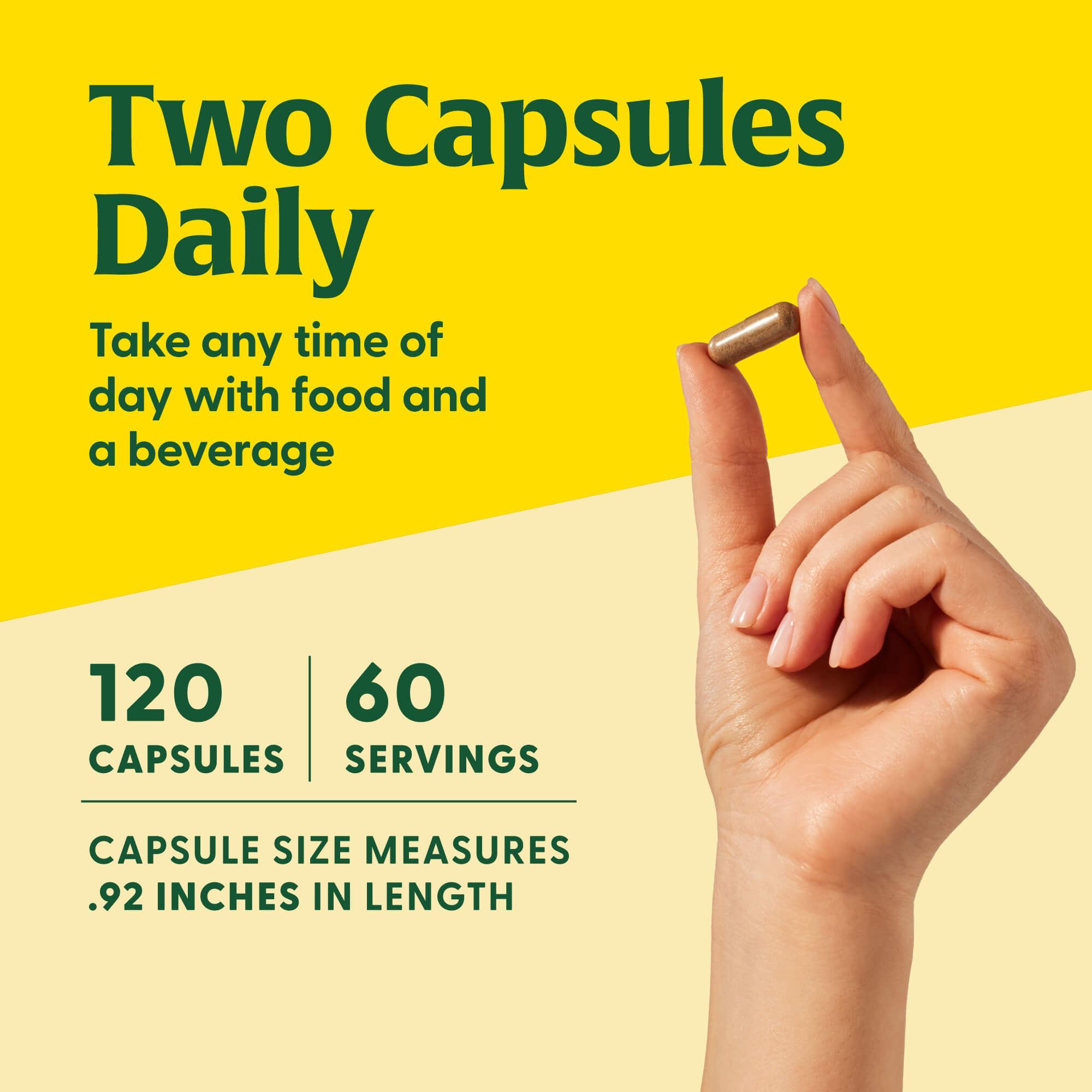 Hand holding a capsule with nutritional information on a yellow background